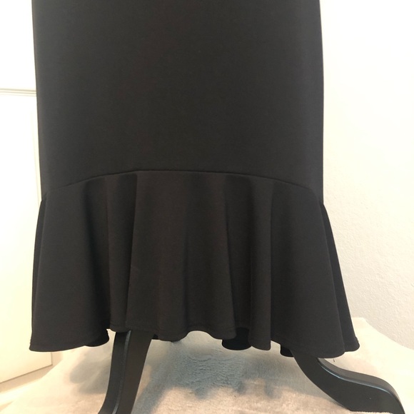 Fitted Black Dress with Ruffle Bottom - Picture 6 of 7